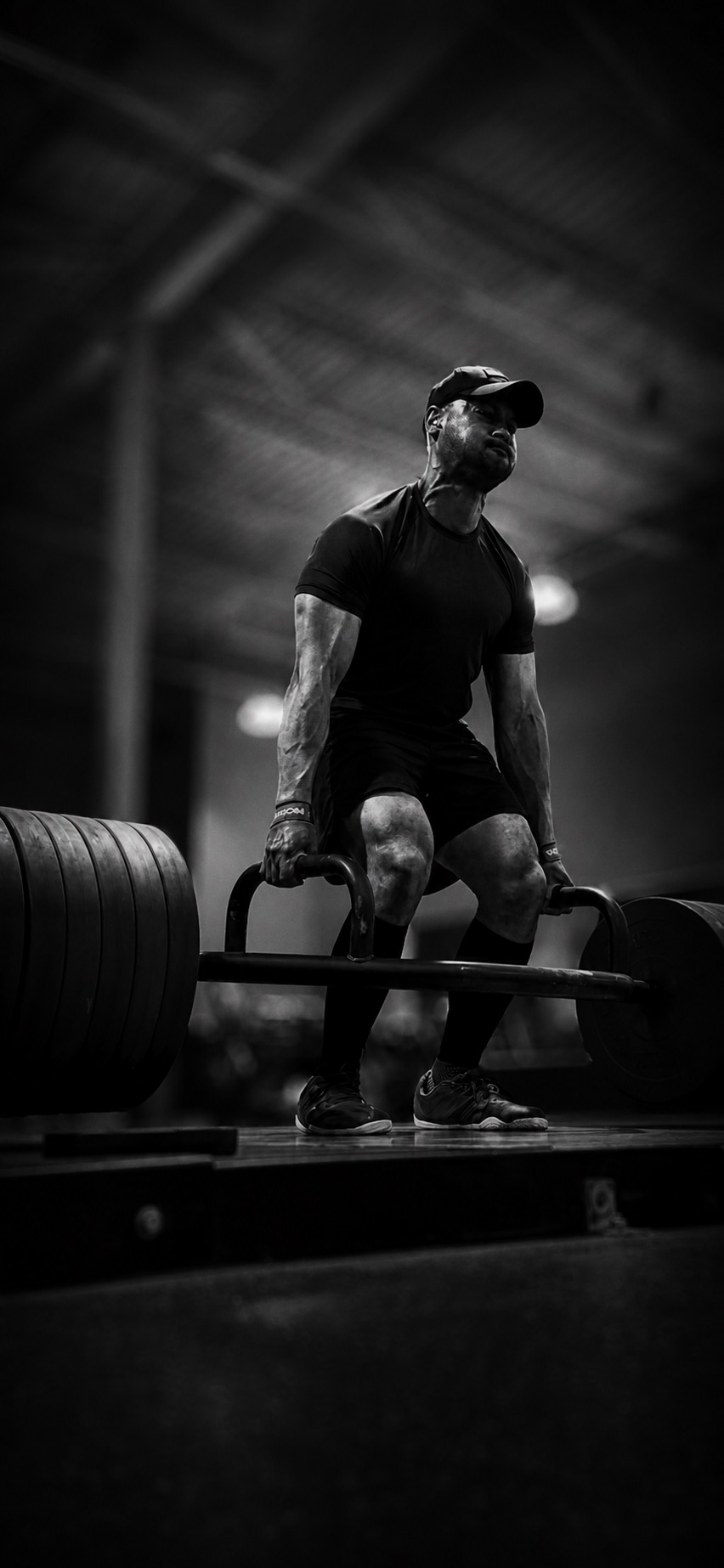 Athlete performing a heavy trap-bar deadlift